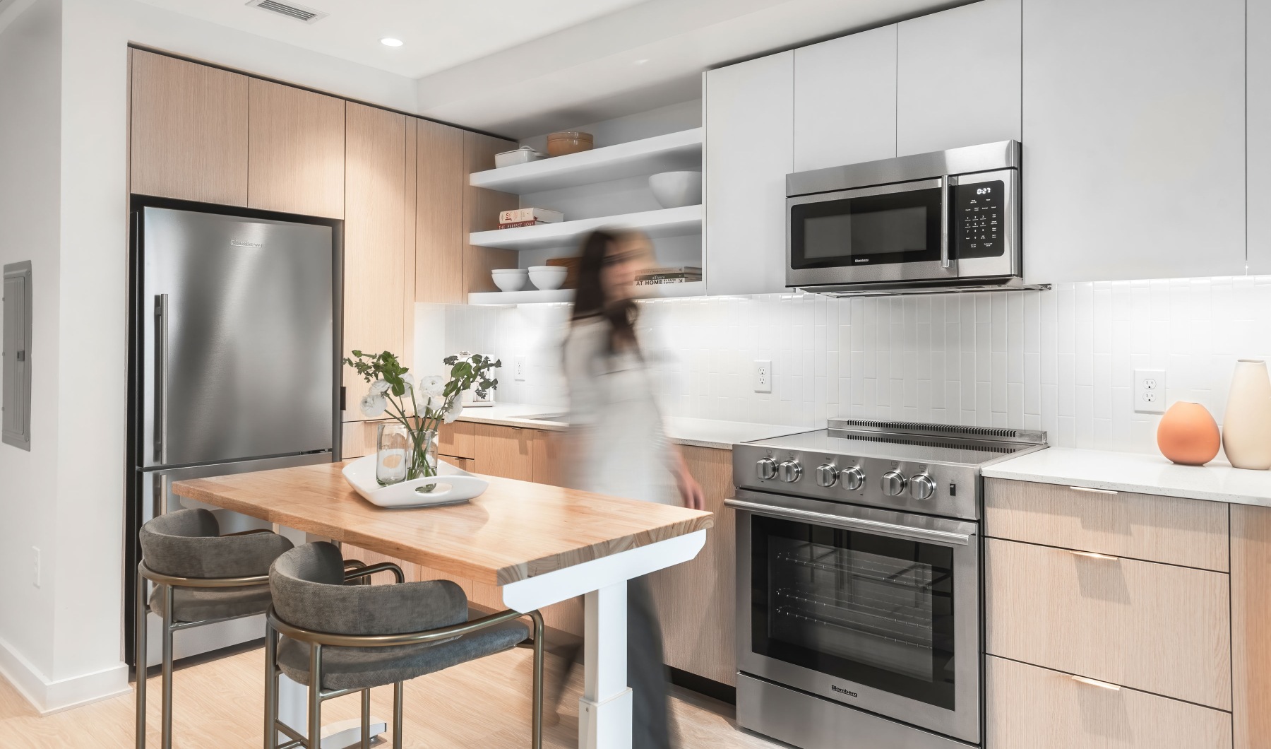 Stainless steel appliances in apartment kitchen at Signal House